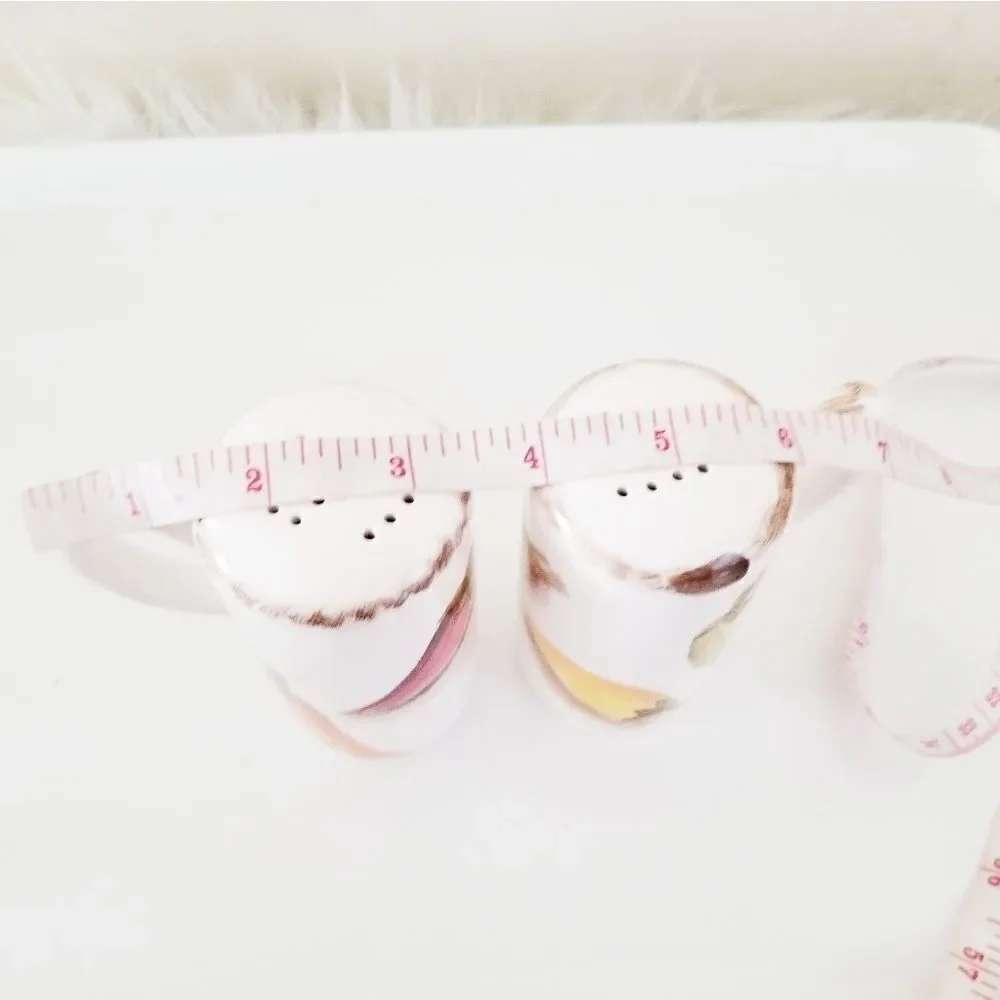 Vintage salt and pepper shakers with hot peppers